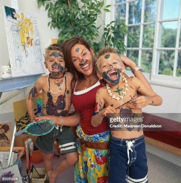 Identical twins Dylan and Cole Sprouse, 14th January 2000. The twins starred in 'Big Daddy,' with Adam Sandler. Pictured with their mother/manager,...