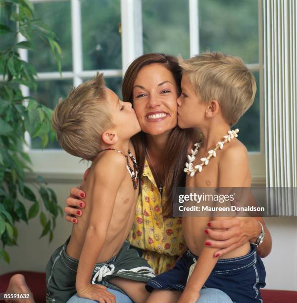 Identical twins Dylan and Cole Sprouse, 14th January 2000. The twins starred in 'Big Daddy,' with Adam Sandler. Pictured with their mother/manager,...