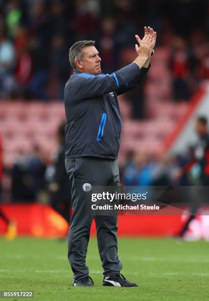 Craig Shakespeare, manager of Leicester City applauds supporters after the scoreless draw in the Premier League match between AFC Bournemouth and...