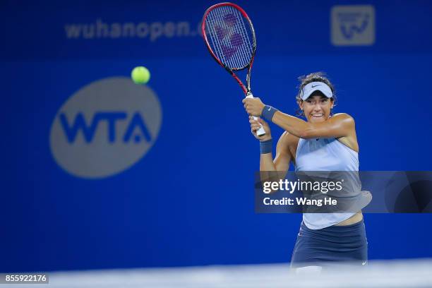 Caroline Garcia of France returns a shot during the Finals match against Ashleigh Barty of Australia on Day 7 of 2017 Dongfeng Motor Wuhan Open at...