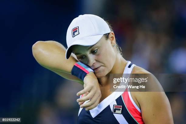 Ashleigh Barty of Australia reacts during the Finals match Caroline Garcia of France on Day 7 of 2017 Dongfeng Motor Wuhan Open at Optics Valley...