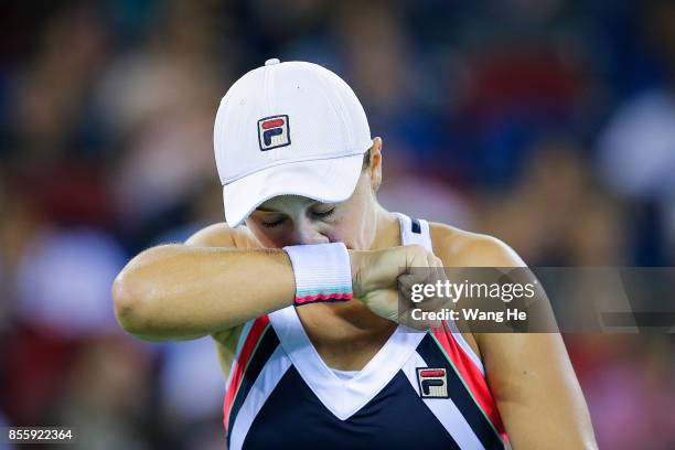 Ashleigh Barty of Australia reacts during the Finals match Caroline Garcia of France on Day 7 of 2017 Dongfeng Motor Wuhan Open at Optics Valley...