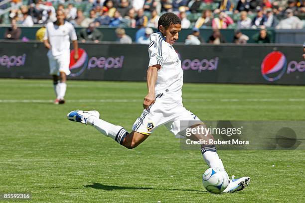 Sean Franklin of the Los Angeles Galaxy takes a shot against D.C. United during the MLS game at Home Depot Center on March 22, 2009 in Carson,...