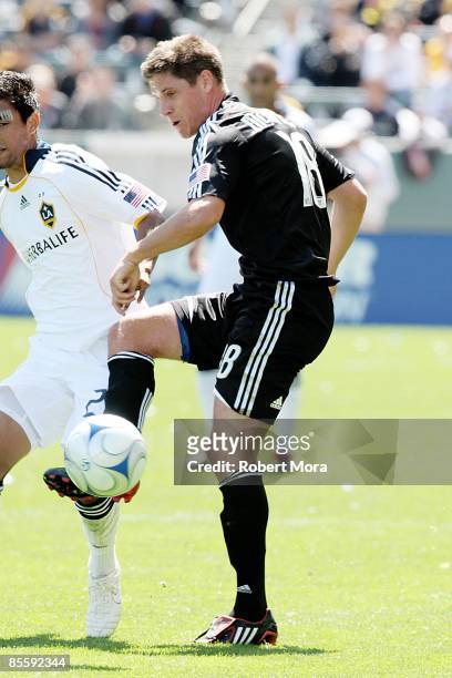 Devon McTavish of D.C. United makes a pass against the Los Angeles Galaxy during the MLS game at Home Depot Center on March 22, 2009 in Carson,...