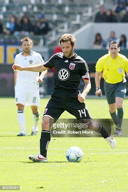 Ben Olsen of D.C. United makes a pass on the attack against the Los Angeles Galaxy during the MLS game at Home Depot Center on March 22, 2009 in...