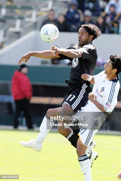 Luciano Emilio of D.C. United attempts to control a loose ball against the Los Angeles Galaxy during the MLS game at Home Depot Center on March 22,...