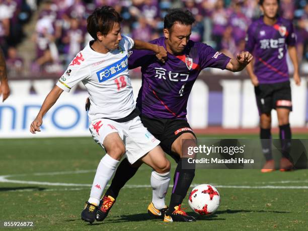 Marcus Tulio Tanaka of Kyoto Sanga and Asahi Yada of JEF United Chiba compete for the ball during the J.League J2 match between Kyoto Sanga and KEF...