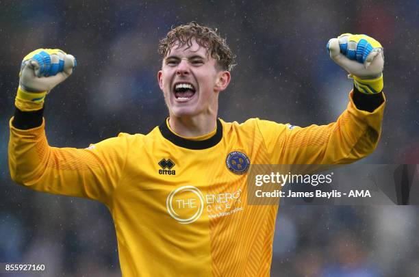 Dean Henderson of Shrewsbury Town celebrates at full time after the Sky Bet League One match between Shrewsbury Town and Scunthorpe United at New...