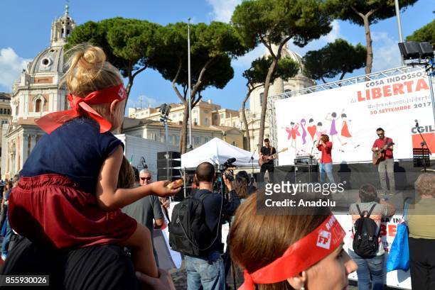 Men and women gather to protest against gender-based violence in Rome, Italy on September 30, 2017.