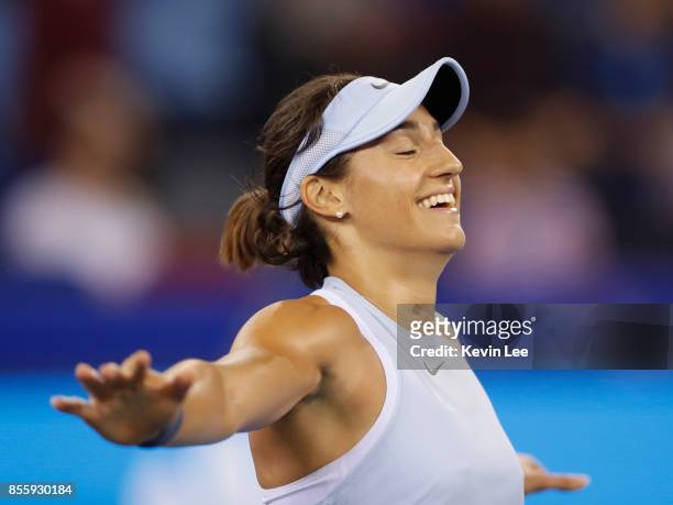 Caroline Garcia of France reacts after defeating Ashleigh Barty of Australia in the Finals match of Women's Single of 2017 Wuhan Open on September...