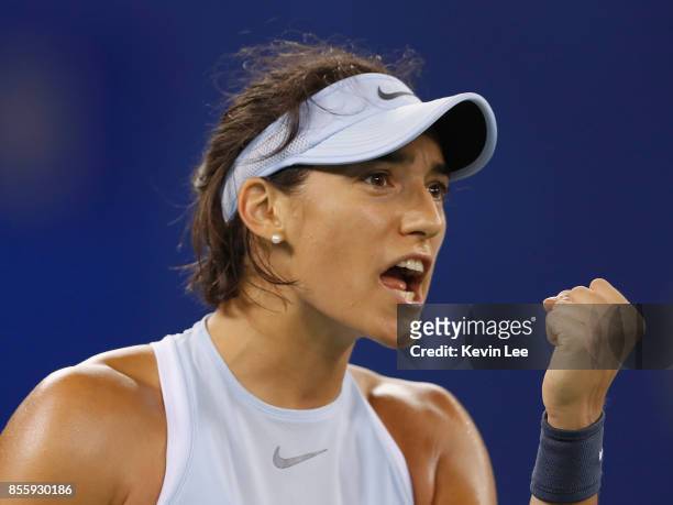 Caroline Garcia of France reacts in the match against Ashleigh Barty of Australia in the Finals match of Women's Single of 2017 Wuhan Open on...