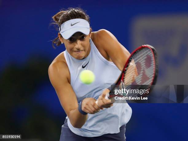 Caroline Garcia of France returns a shot to Ashleigh Barty of Australia in the Finals match of Women's Single of 2017 Wuhan Open on September 30,...