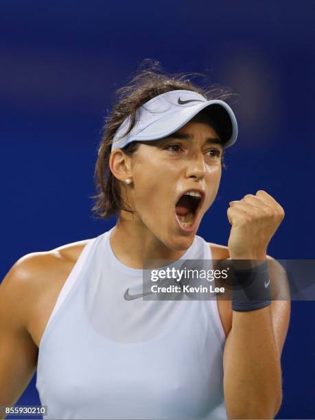 Caroline Garcia of France reacts in the match against Ashleigh Barty of Australia in the Finals match of Women's Single of 2017 Wuhan Open on...