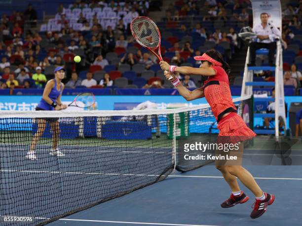 Shuko Aoyama of Japan in action in Finals Double match between Yung-Jan Chan of Chinese Taipei and Martina Hingis of Switzerland and Shuko Aoyama of...