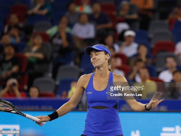 Martina Hingis of Switzerland reacts in the Women's Final Double match between Yung-Jan Chan of Chinese Taipei and Martina Hingis of Switzerland and...