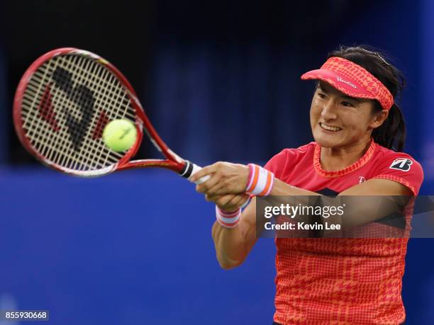 Shuko Aoyama of Japan in action in Finals Double match between Yung-Jan Chan of Chinese Taipei and Martina Hingis of Switzerland and Shuko Aoyama of...