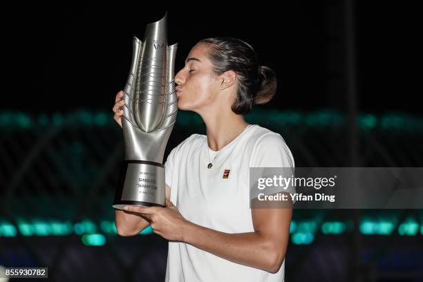 Caroline Garcia kisses the trophy for the champion portrait after winning the ladies singles final between Ashleigh Barty of Australia and Caroline...