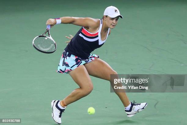 Ashleigh Barty plays a backhand during the ladies singles final between Ashleigh Barty of Australia and Caroline Garcia of France during Day 7of 2017...