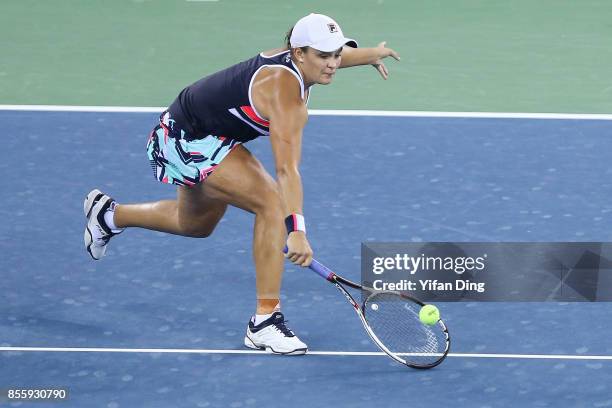 Ashleigh Barty plays a backhand during the ladies singles final between Ashleigh Barty of Australia and Caroline Garcia of France during Day 7of 2017...