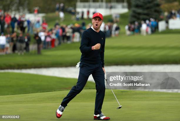Justin Thomas of the U.S. Team reacts to his putt during the Saturday morning foursomes matches during the third round of the Presidents Cup at...
