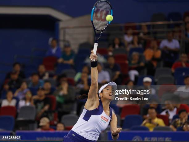 Yung-Jan Chan of Chinese Taipei in action in the Women's Final Match between Yung-Jan Chan of Chinese Taipei and Martina Hingis of Switzerland and...