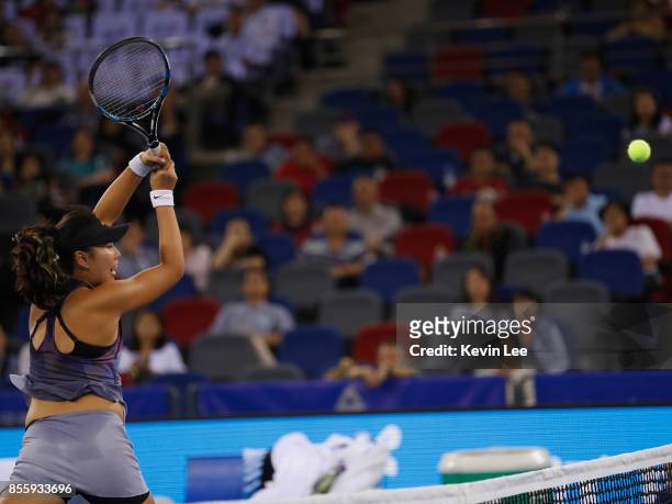 Zhaoxuan Yang of China in action in the Women's Double Match between Shuko Aoyama of Japan and Yung-Jan Chan of Chinese Taipei and Martina Hingis of...