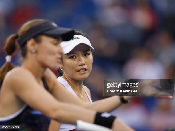 Yung-Jan Chan of Chinese Taipei and Martina Hingis of Switzerland in action against Shuko Aoyama of Japan and Zhaoxuan Yang of China in the Women's...
