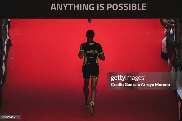 An athlete arrives to the finish line of the IRONMAN Barcelona on September 30, 2017 in Calella, Barcelona province, Spain.