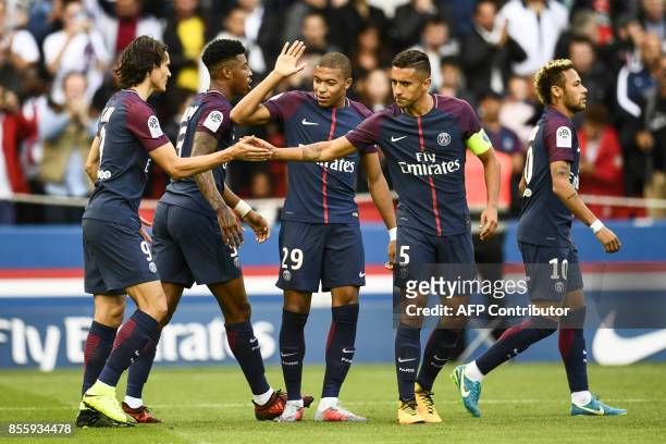 Paris Saint-Germain's Uruguayan forward Edinson Cavani, Paris Saint-Germain's French defender Presnel Kimpembe, Paris Saint-Germain's French forward...