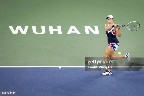 Ashleigh Barty of Australia returns a shot during the Finals match Caroline Garcia of France on Day 7 of 2017 Dongfeng Motor Wuhan Open at Optics...