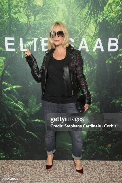 French actress Emmanuelle Beart attends the Elie Saab show as part of the Paris Fashion Week Womenswear Spring/Summer 2018 at on September 30, 2017...