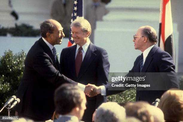 This handout file photo provided by the Israeli Government Press Office on March 25 shows Israeli Prime Minister Menahem Begin and Egyptian President...