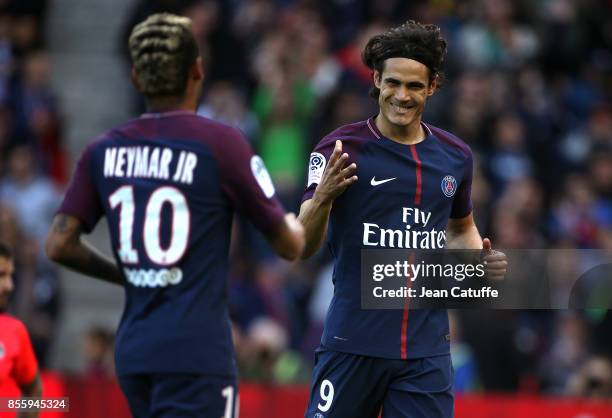 Edinson Cavani of PSG celebrates his goal with Neymar Jr during the French Ligue 1 match between Paris Saint-Germain and FC Girondins de Bordeaux at...