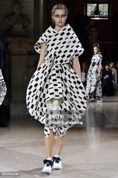 Model walks the runway at the Junya Watanabe Spring Summer 2018 fashion show during Paris Fashion Week on September 30, 2017 in Paris, France.