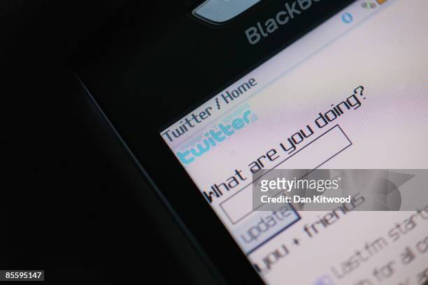 In this photo illustration the Social networking site Twitter is displayed on a mobile phone on March 25, 2009 in London, England. The British...