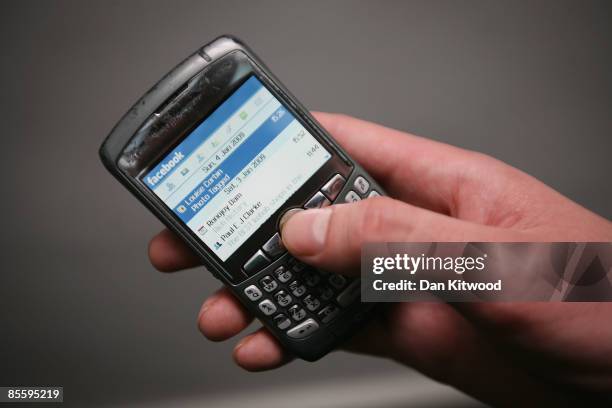 In this photo illustration the Social networking site Facebook is displayed on a mobile phone on March 25, 2009 in London, England. The British...