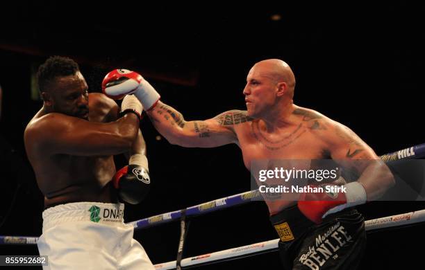 Robert Filipovic lands a shot on Dereck Chisora during the Battle on the Mersey Heavyweight fight at Echo Arena on September 30, 2017 in Liverpool,...