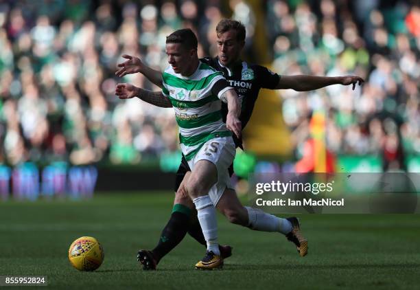 Jonathan Hayes of Celtic vies with Steven Whittaker of Hibernian during the Ladbrokes Scottish Premiership match between Celtic and Hibernian at...