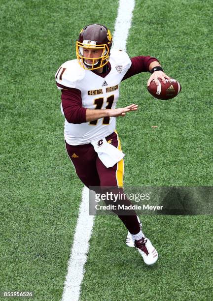 Shane Morris of the Central Michigan Chippewas looks for a pass against the Boston College Eagles during the first quarter at Alumni Stadium on...