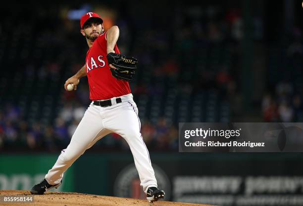 Miguel Gonzalez of the Texas Rangers pitches in the first inning against the Oakland Athletics at Globe Life Park in Arlington on September 28, 2017...