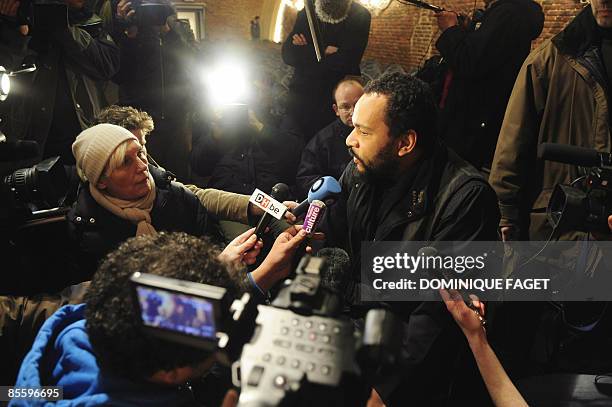 French controversial humorist Dieudonne speaks to journalists during a press conference ahead of his show on March 25, 2009 in Brussels, Belgium....