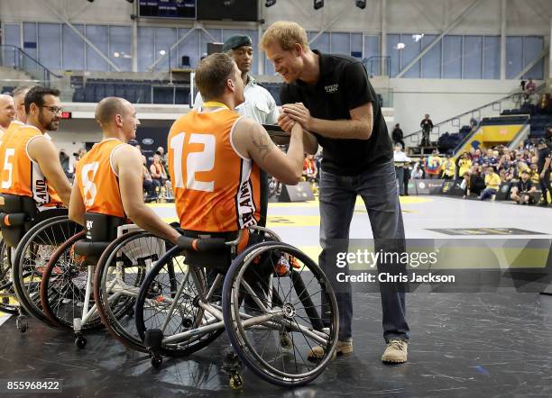 Prince Harry congratulates the competitors at the Wheelchair Basketball Finals during the Invictus Games 2017 at Mattamy Athletic Centre on September...