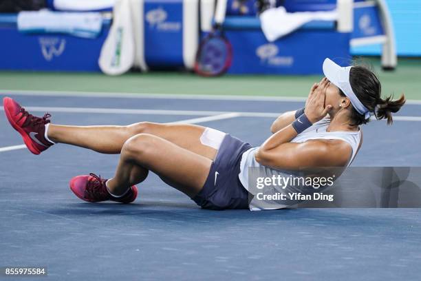 Caroline Garcia reacts after winning the ladies singles final between Ashleigh Barty of Australia and Caroline Garcia of France during Day 7of 2017...