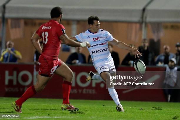 Racing-Metro's winger Juan Jose Imhoff kicks the ball during the French Top 14 rugby union match between Racing Metro 92 and Lyon Olympique...