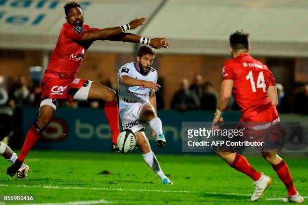 Racing-Metro's Teddy Iribaren kicks the ball during the French Top 14 rugby union match between Racing Metro 92 and Lyon Olympique Universitaire on...