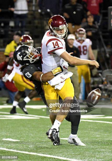 Washington State Cougars linebacker Jahad Woods sacks USC Trojans quarterback Sam Darnold causing him to fumble the ball away to end USC's chances of...