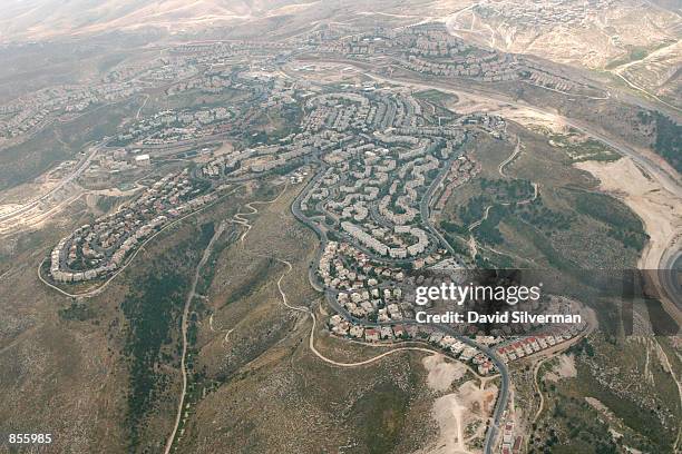 The West Bank Israeli settlement of Maale Adumim is spread over the Judean Hills in an April 22, 2002 aerial photo. Palestinians are demanding a...
