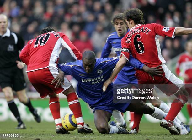 Chelsea's Carlton Cole is tackled by Middlesbrough's Gareth Southgate and Fabio Rochemback