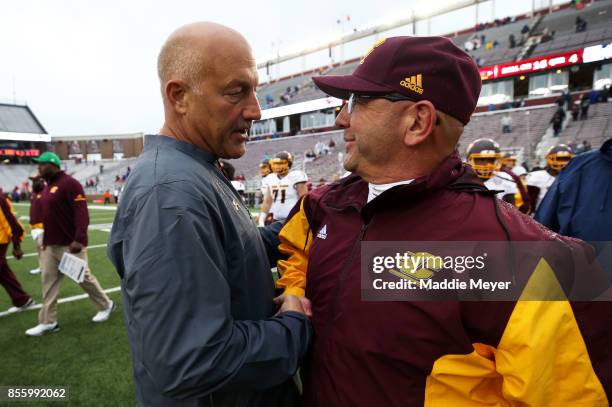 Head coach Steve Addazio of the Boston College Eagles and head coach John Bonamego of the Central Michigan Chippewas shake hands after the Eagles...