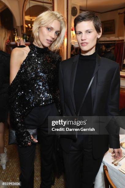 Saskia De Brauw and Anja Rubik attend a dinner in Paris to celebrate Another Magazine A/W17 hosted by Vivienne Westwood, Andreas Kronthaler,...